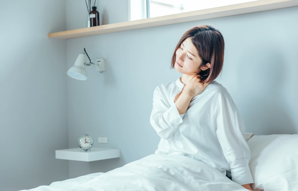 体調不良の女性